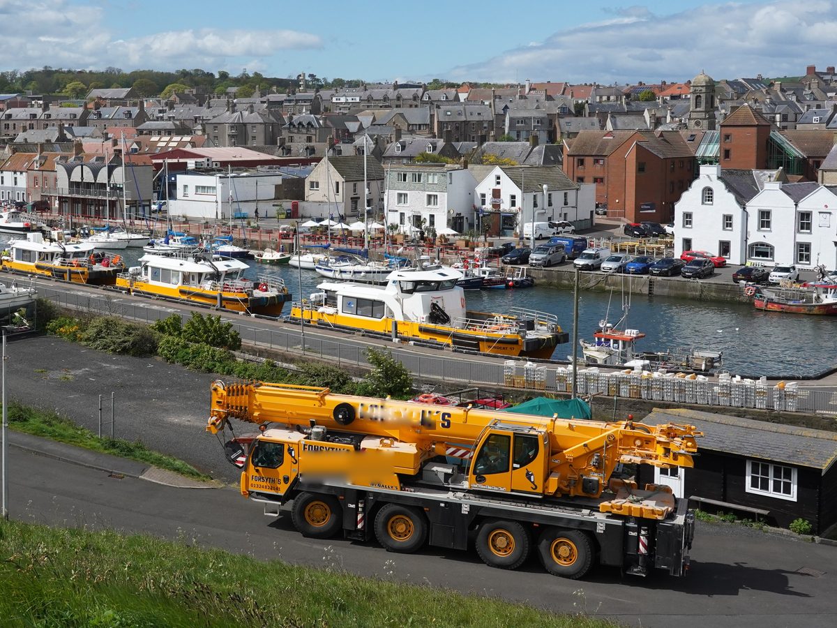 All-terrain crane mobilised to a coastal town